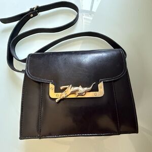 1996 Vintage SASHA black bag with gold colored jaguar